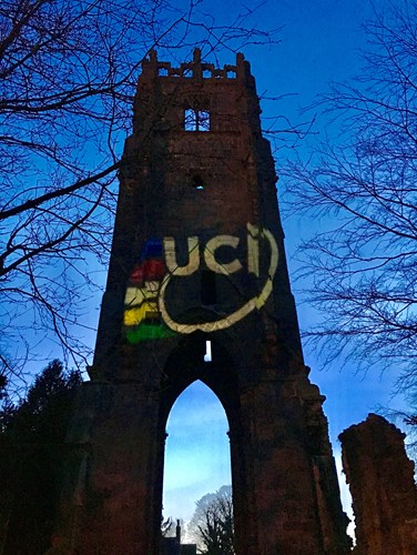 Image of Friary Tower, Richmond, lit up in the colours of the iconic UCI rainbow jersey, March 2019