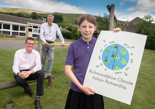 Violet is pictured with Mike Sparrow (centre) and school headteacher, Gordon Stainsby