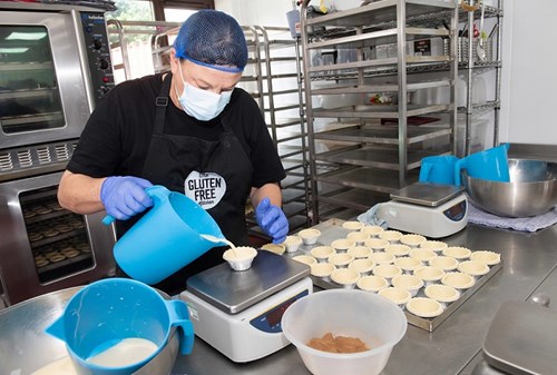 Employee producing food at Gluten Free Kitchen in Leyburn