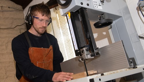 Tom Addison using the new band saw