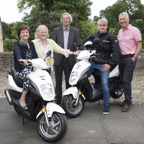 Area Partnership Chairs, Councillor Yvonne Peacock, Councillor Clive World and Fleur Butler with scheme user Oliver Baker Haste and Wheels 2 Work co-ordinator, Andy Reddick