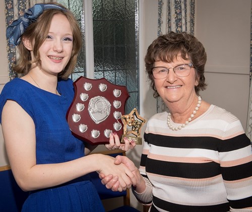 Sarah being congratulated by Councillor Yvonne Peacock